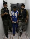 Wael Said Saad accompagnato da due poliziotti, il 15 luglio 2008 a Jenin Wael Said Saad accompagnato da due poliziotti, il 15 luglio 2008 a Jenin