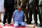 Al-Noami viene fatto inginocchiare per essere giustiziato Al-Noami viene fatto inginocchiare per essere giustiziato